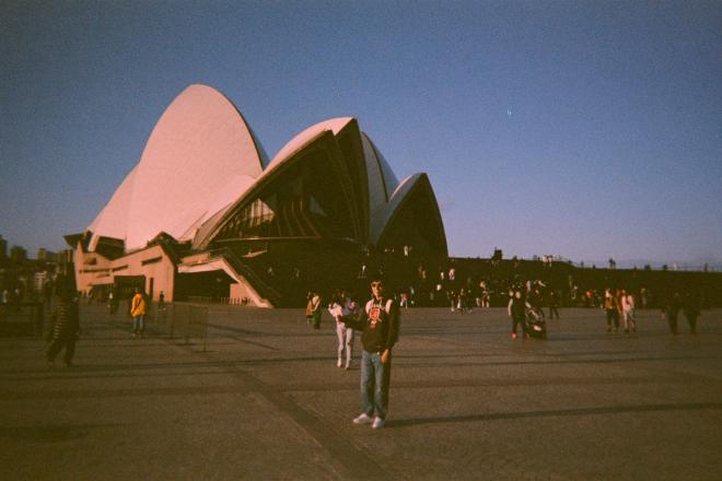 Person in front of a building